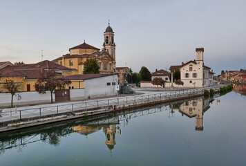Gaggiano, Milan, Italy: Gaggiano, historic town with colorful buildings along the Naviglio Grande,