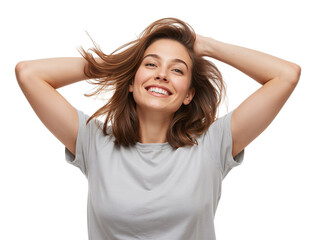 Fototapeta premium Radiant woman joyfully tosses her hair, exuding confidence and happiness with a carefree attitude