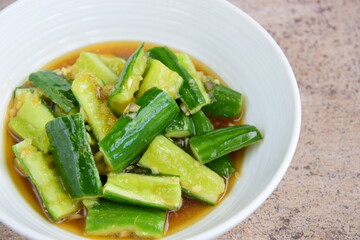 Asian crushed cucumber salad with garlic, soy sauce and sesame oil