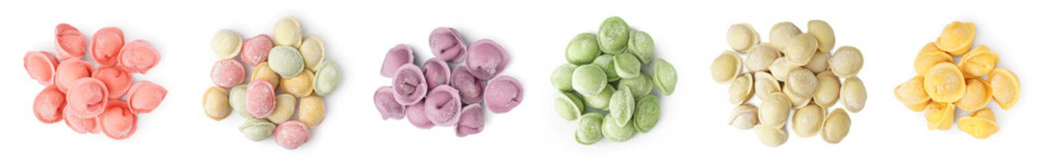 Set of colorful raw dumplings on white background, top view