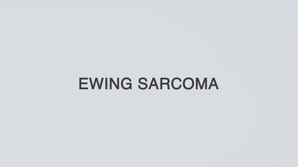 Ewing sarcoma word diagnosed with a stethoscope held in hand on a white background, illustrating bone cancer, medical evaluation, healthcare concept, and patient awareness