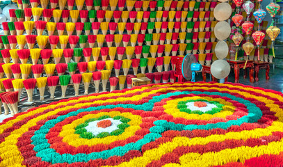 Traditional incense shop with colorful incense sticks in Hue, Vietnam