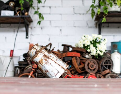 Rusty machine amidst salvaged parts
