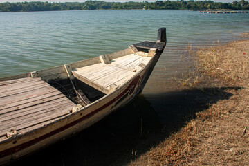 Obraz premium wooden boat on the lake