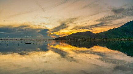 Lap An Lagoon in dawn sunrise is a brackish water lagoon located on the shore of Lang Co Bay. This is one of 12 typical lagoons of Central Vietnam.