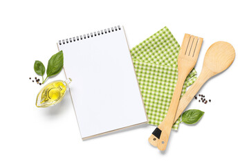 Composition with blank recipe book, wooden cutlery and spices on white background