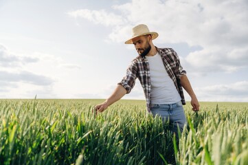 Rural non-urban scene, country business. Man farmer is on the agricultural field