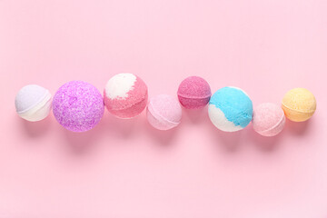 Composition with different bath bombs on pink background