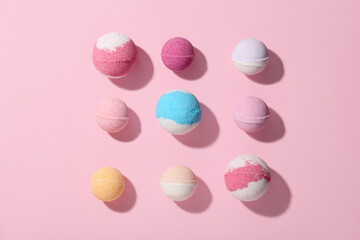 Composition with different bath bombs on pink background