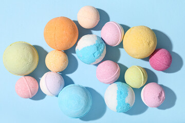 Composition with different bath bombs on color background