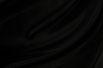 Black gray satin dark fabric texture luxurious shiny that is abstract silk cloth background with patterns soft waves blur beautiful.