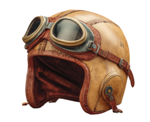 Vintage leather aviator helmet.  Detailed close-up of a light brown and tan leather motorcycle helmet with goggles.  Stitching and rivets add to the aged aesthetic