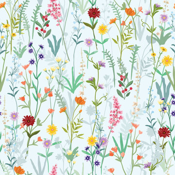 Beautiful colorful wildflower and green leaf seamless pattern