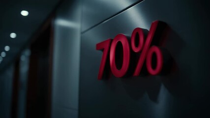 Bright red numbers display a 70 percent completion status on a sleek wall in a contemporary interior.