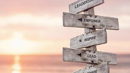 leadership empower inspire lead share text quote on wooden signpost 4k slow pan and zoom - Powered by Adobe