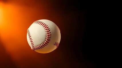 Baseball suspended mid-air with an intense orange glow, isolated in cinematic darkness.