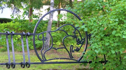 A bench with bison engraving in National Park Belarus. - Powered by Adobe