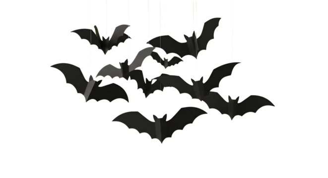 Spooky flock of black paper bats suspended mid-air creating a dramatic Halloween atmosphere for festive decorating