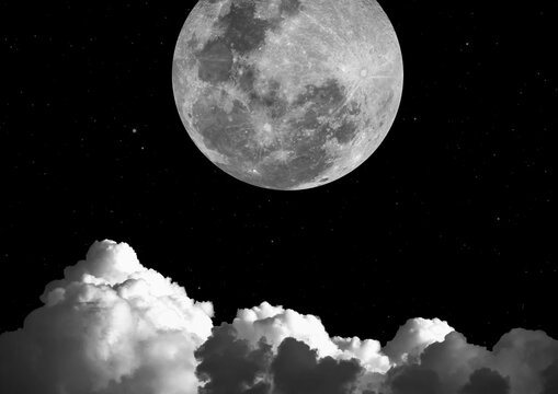 White clouds on a full moon background