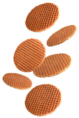 Weightless sweet wafers floating in the air isolated on transparent background.