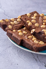 Homemade chocolate brownie photography . Top view on rustic background.Rich chocolate brownie , showcasing its dense texture and glossy surface, professional food photography, 