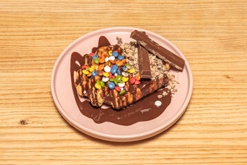 Crispy Praline Waffles: Coarsely toasted and caramelized hazelnuts on molten chocolate