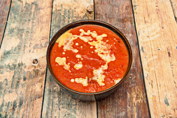 Spicy Chana Masala: Chickpeas cooked in a tomato, cumin, and garam masala sauce, accompanied by fresh cilantro