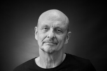 Monochrome Portrait of a senior man in a vintage Harcourt style lighting