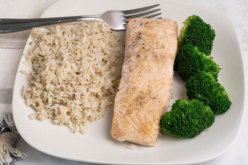 seasoned salmon  with  broccoli and rice