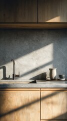 Modern kitchen interior with natural light casting shadows on wooden surfaces and minimalist decor.