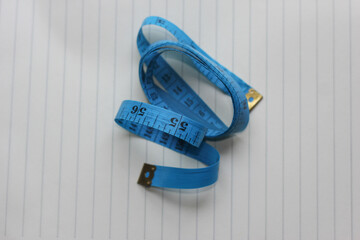 tape measure on blue background