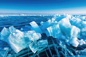 Chunks of vibrant blue ice on a frozen lake
