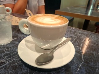 Close up photo of cup of cappuccino