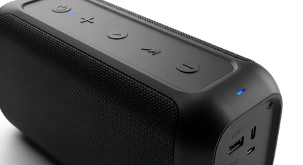 Close-up of a black portable speaker.  Control panel with multiple buttons, including play/pause, volume, and navigation.  Small blue LED light indicator.  Textured speaker surface