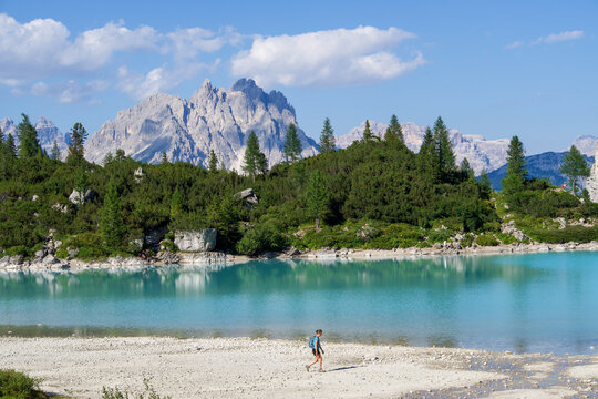 Woman on the lake, Sorapis Lake, Dolomites Mountains, Italy 