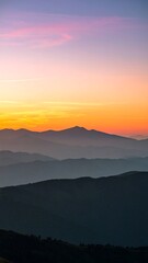 Fototapeta premium Sunrise over mountain ranges