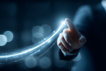 A hand points at a glowing, futuristic light trail.