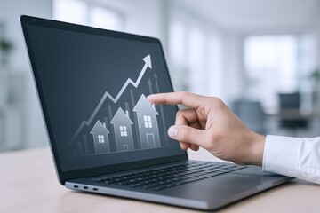 Real Estate Market Growth on Laptop Screen Display, Hand Pointing to Rising Arrow and House Icons