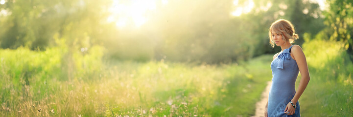 Woman in Summer Field Wide Banner with Copy Space