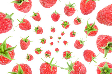 Fresh raspberries swirling in air against white background