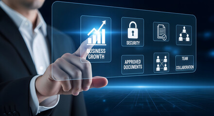 Businessman points to business growth concept on futuristic digital interface, modern technology