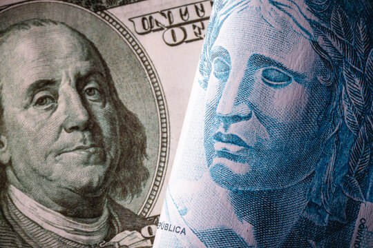 Brazilian money, real banknotes and dollar bills, financial crisis, dark image, financial crisis, economic tension