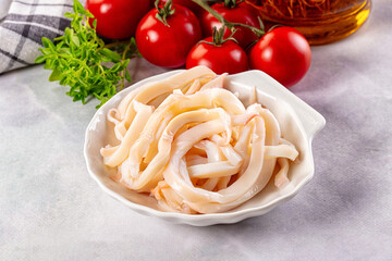 Canned marinated squid rings heap