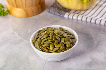Fresh green pumpkin peeled seeds