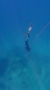 Scuba diver dives underwater. Sea vacation. Motivational video. Background.