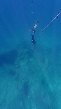 Scuba diver dives underwater. Sea vacation. Motivational video. Background.