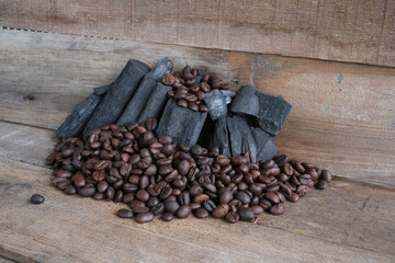 Coffee beans on a wooden background