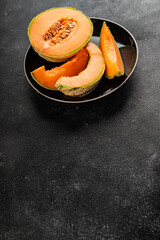 Melon Charente ripe sweet fruit tasty snack fresh delicious gourmet food background on the table rustic food top view copy space keto and paleo diet vegan and vegetarian food