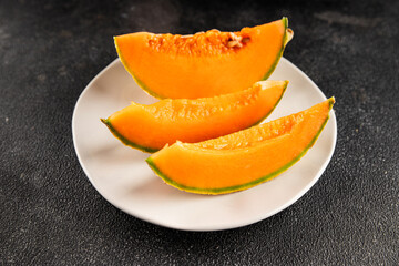 Melon Charente ripe sweet fruit tasty snack fresh delicious gourmet food background on the table rustic food top view copy space keto and paleo diet vegan and vegetarian food