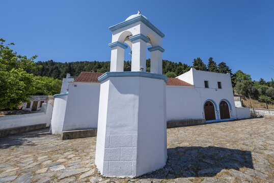 Bell tower and white church of Panagia Agios Dimitros, ruined town of Agios Dimitrios, Kos, Dodecanese, Greece